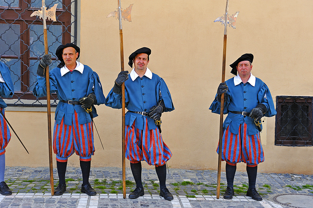 guards in medieval costume beside the former Council House housing a History Museum, Council Square (piata Sfatului), Brasov, Transylvania,Romania,Southeastern and Central Europe