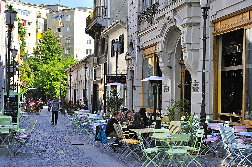 Cafe terraces in Covaci street, Lipscani district, Old Town, Bucharest, Romania