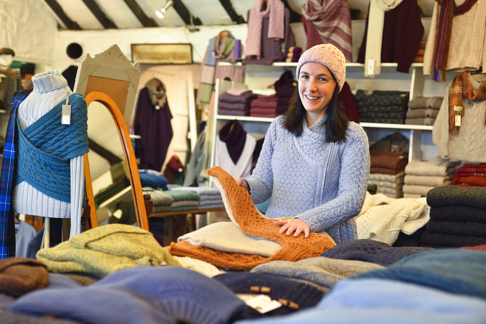 Caitriona Conneely in her Cottage Handcrafts shop, selling Irish knitwear, Moyard, Connemara, County Galway, Connacht, Republic of Ireland