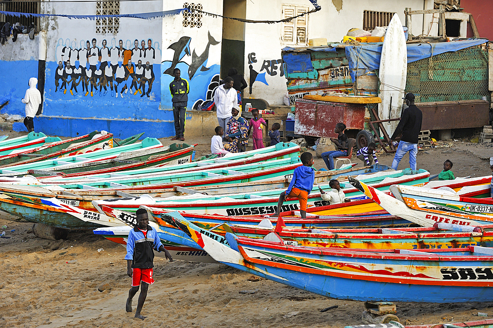 Fishing dugout boats on beach, Ngor village, Pointe des Almadies, Dakar, Senegal, West Africa