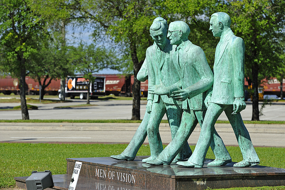 The Men of Vision sculpture, by David Cargill, on the grounds of the Art Museum of Southeast Texas. The bronze sculpture depicts the Rogers Brothers of Beaumont, Texas who were known for their visionary community and business ways and also founded Texas S