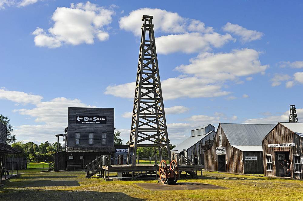 Oil derrick and buildings, Spindletop boomtown period, Spindletop-Gladys City Boomtown Museum, Beaumont, Texas, United States of America