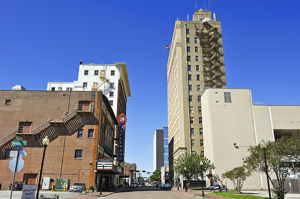 Jefferson Theatre with San Jacinto Building in the background, Fannin Street in downtown Beaumont, Texas, United States of America