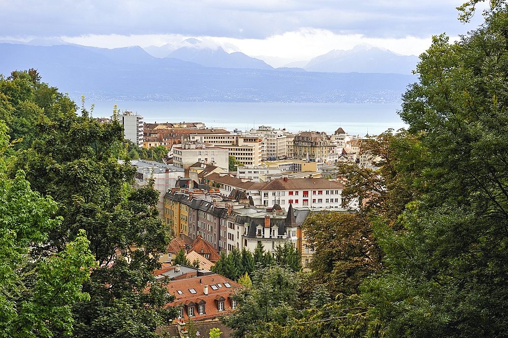 overview of the city with the Leman Lake in background seen from the gardens of the Fondation de l'Hermitage,Lausanne,Canton of Vaud,Switzerland,Europe