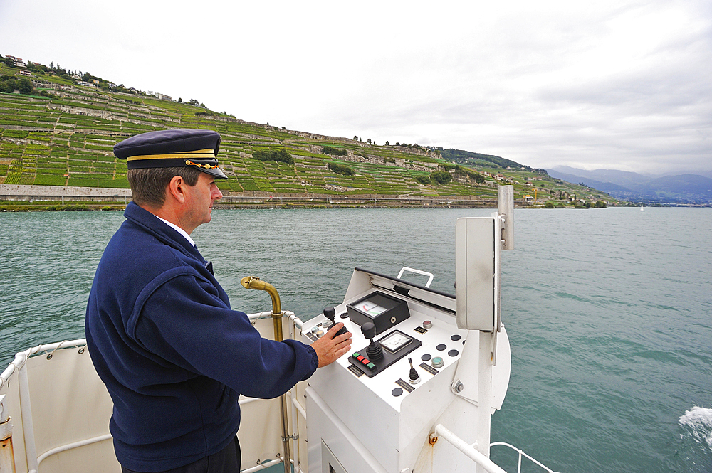 Captain of the Belle Epoque paddle steamer La Suisse on Lake Leman, Lausanne, Canton of Vaud, Switzerland