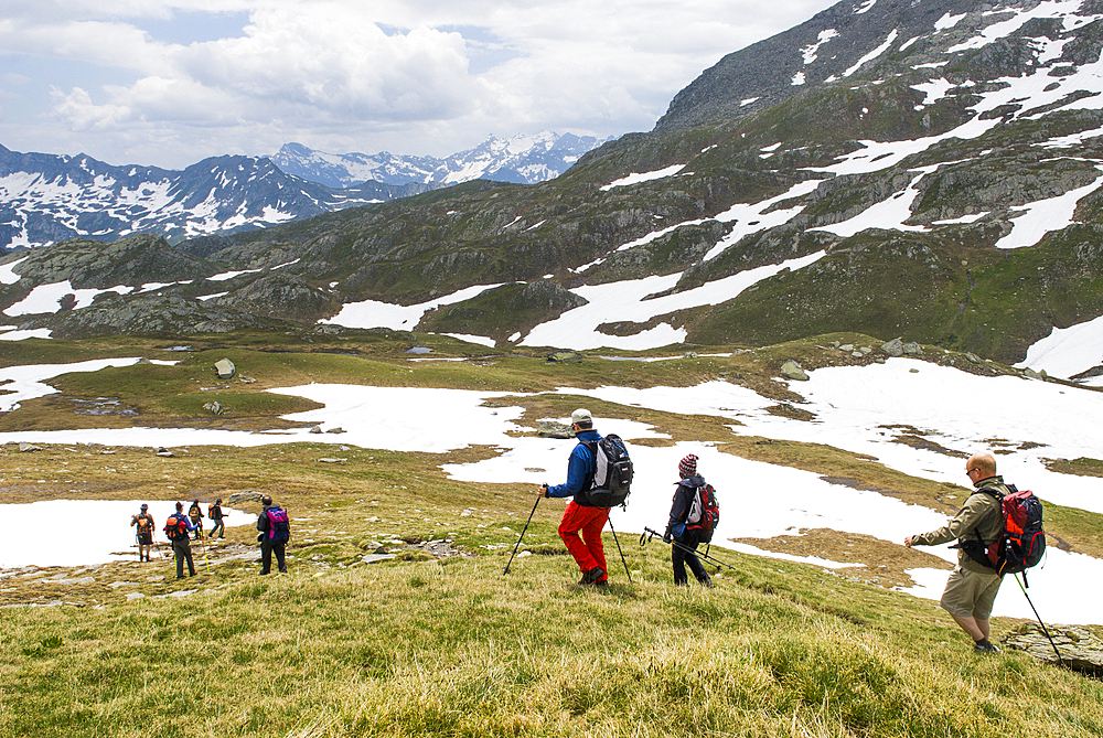 Trekkers in Cadlimo valley, Val Piora, Canton Ticino, Switzerland