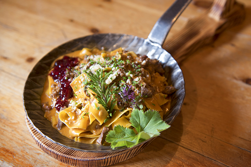 meal (homemade Papardelle) served at Knuttenalm mountain restaurant (Malga Knutten), Riva Valley (Italian: Val di Riva, German: Reintal), adjacent to Ahrntal (Valle Aurina), Trentino-Alto Adige, Sudtyrol, South Tyrol, Italy, South-central Europe