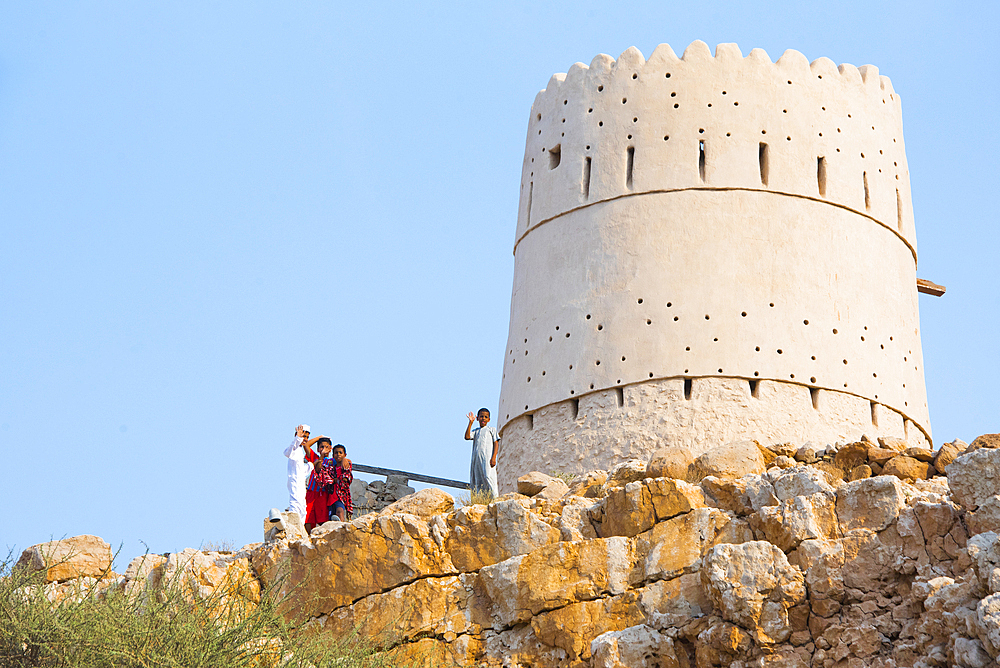 Fort tower at the mouth of the Wadi Shab, canyon near Tiwi, of Oman, Arabian Peninsula