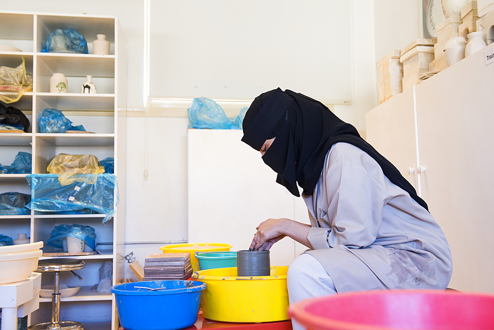 Madrasat Adeera, originaly a Girl's School, now an artistic space where women learn and practice different crafts, here a pottery workshop, whose creations will be sold at the market in the old town of AlUla, Medina Province, Saudi Arabia, Middle East