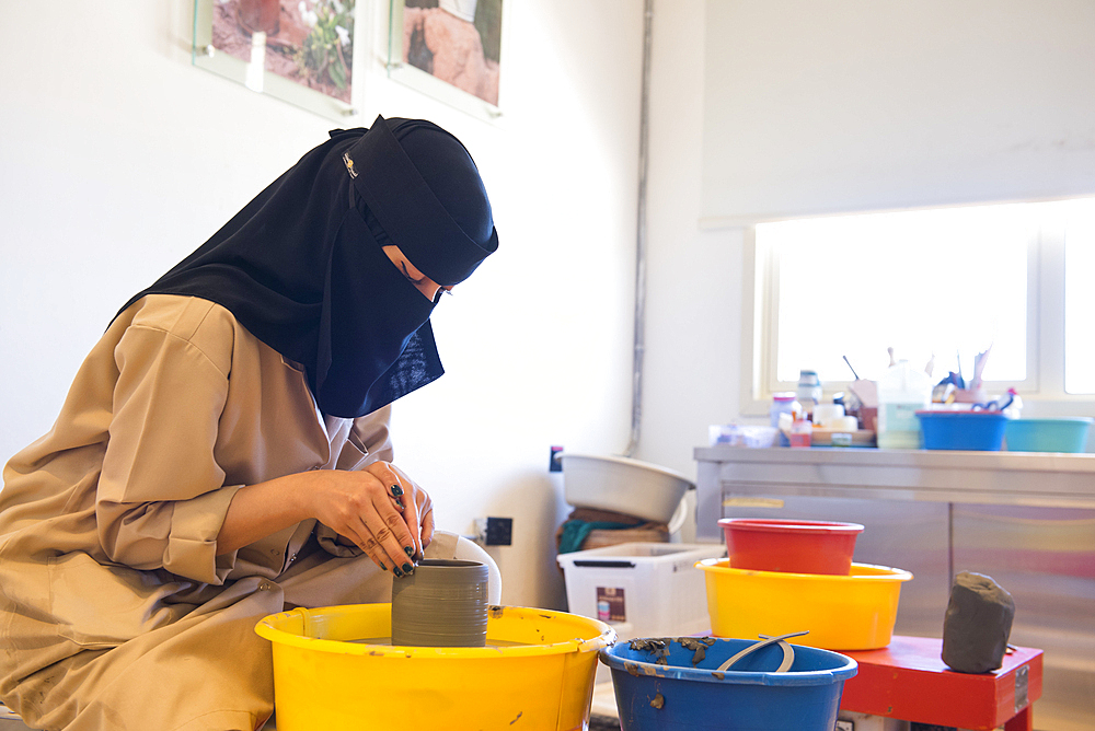 Madrasat Adeera, originaly a Girl's School, now an artistic space where women learn and practice different crafts, here a pottery workshop, whose creations will be sold at the market in the old town of AlUla, Medina Province, Saudi Arabia, Middle East