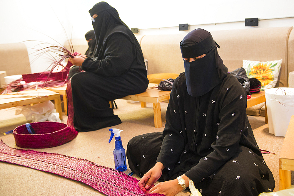 Madrasat Adeera, originaly a Girl's School, now an artistic space where women learn and practice different crafts, here a weaving and basketry workshop, whose creations will be sold in the old town of AlUla, Medina Province, Saudi Arabia, Middle East