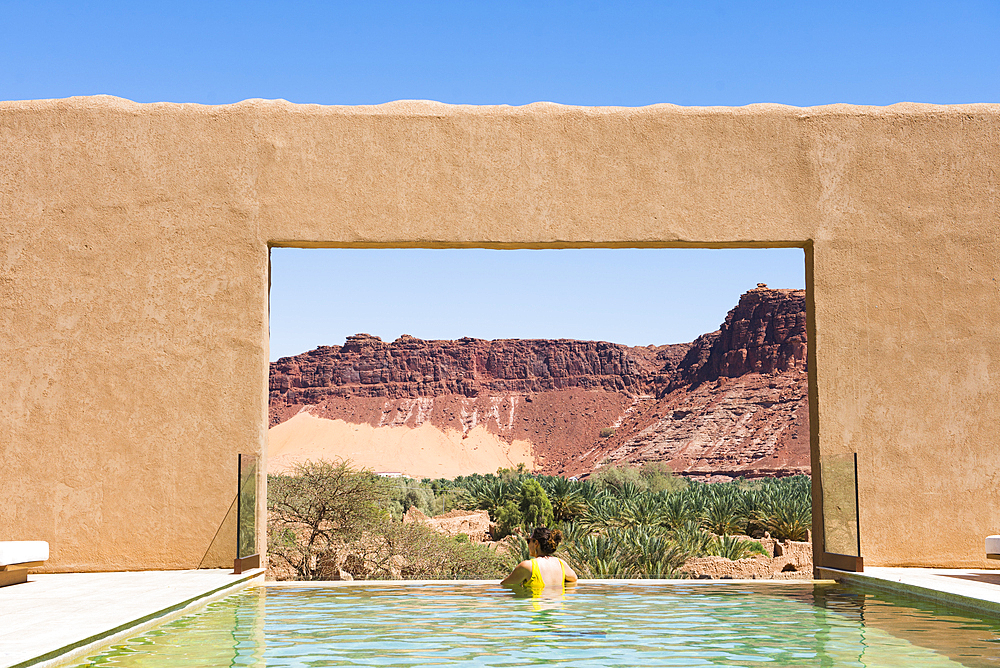 Swimming pool of Dar Tantora The House Hotel, a renovated original mudbrick village in the oasis of AlUla, Medina Province, Saudi Arabia, Middle East