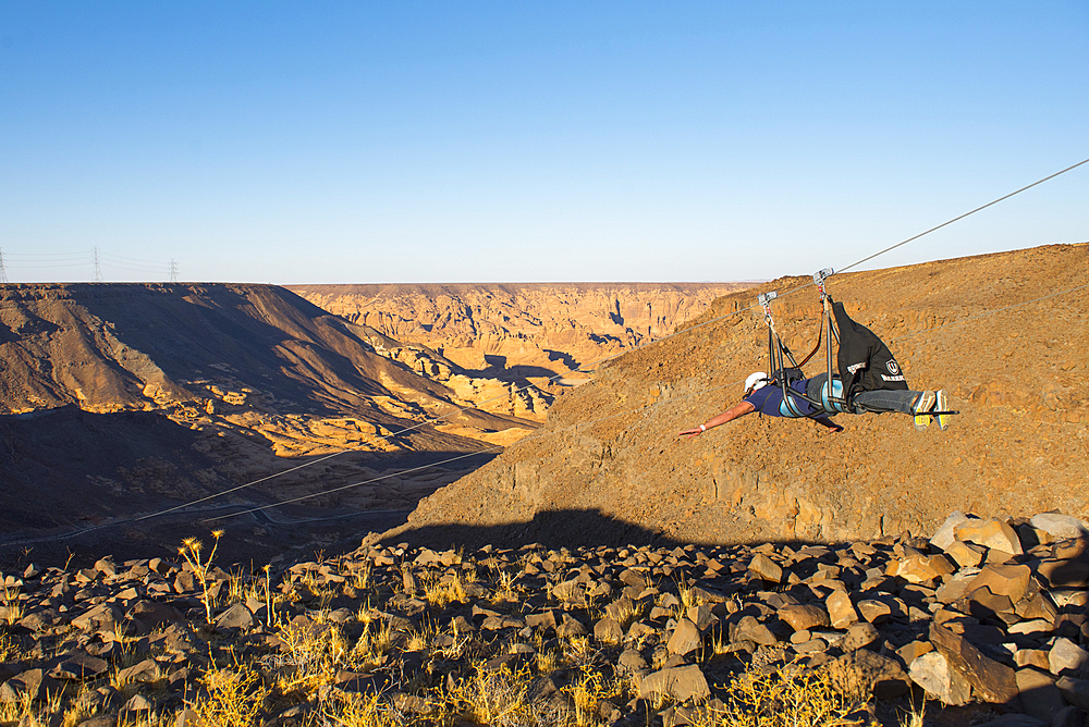 AlUla Zipline, starting from Harrat volcanic plateau, racing 1,5km at up to 120km/h speed, enjoying the incredible scenery of the Mountains, Medina Province, Saudi Arabia, Middle East