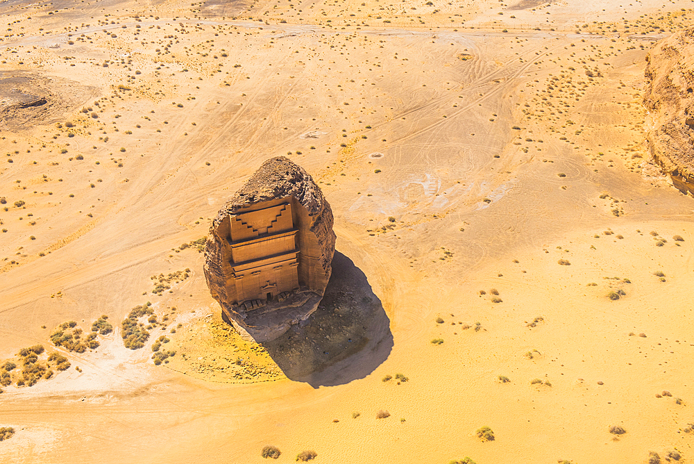 Aerial view of Qasr al-Farīd, the largest tomb within the UNESCO World Heritage Site of Hegra, also known as Mada'in Salih, in the area of AlUla, Medina Province, Saudi Arabia, Middle East