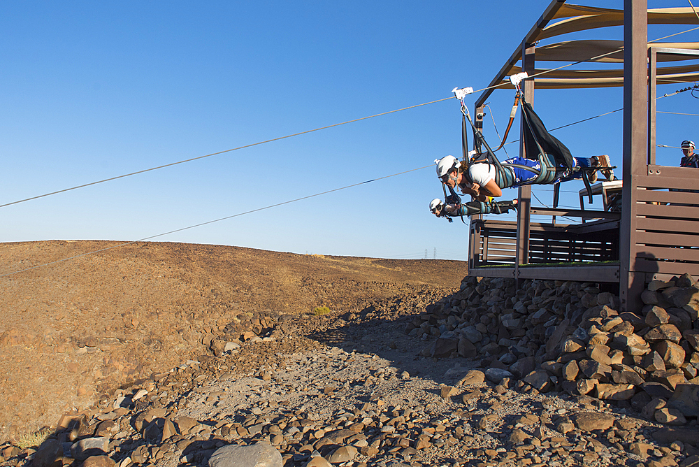 AlUla Zipline, starting from Harrat volcanic plateau, racing 1,5km at up to 120km/h speed, enjoying the incredible scenery of the Mountains, Medina Province, Saudi Arabia, Middle East