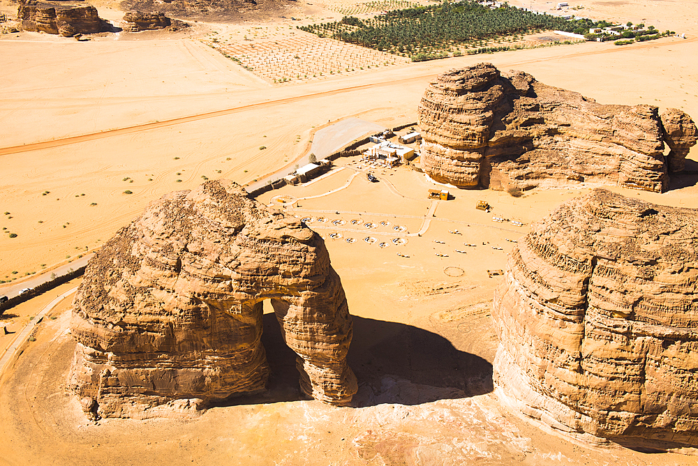 Aerial view of the Jabal Alfil, also known as Elephant Rock, a natural red sandstone formation, in the area of AlUla, Medina Province, Saudi Arabia, Middle East