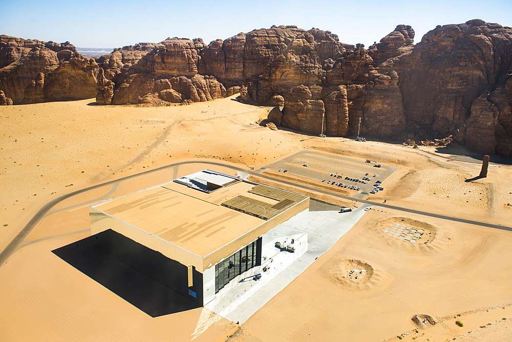 Aerial view of the Maraya Theatre (architect: studio Gio Forma). Magnificent mirrored structure in AlUla's Ashar Valley, which seems disappear into the surrounding sandstone cliffs, like a mirage.AlUla, Medina Province, Saudi Arabia, Middle East