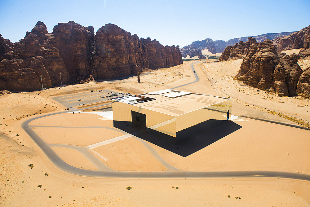 Aerial view of the Maraya Theatre (architect: studio Gio Forma). Magnificent mirrored structure in AlUla's Ashar Valley, which seems disappear into the surrounding sandstone cliffs, like a mirage.AlUla, Medina Province, Saudi Arabia, Middle East