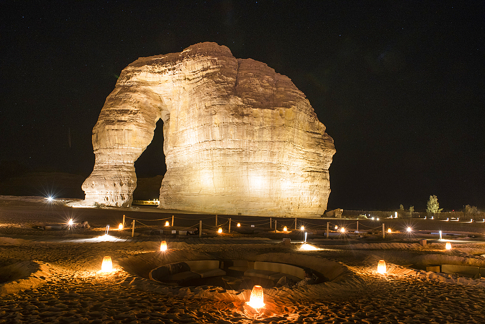 Jabal Alfil by night, also known as Elephant Rock, a natural red sandstone formation in the area of AlUla, Medina Province, Saudi Arabia, Middle East