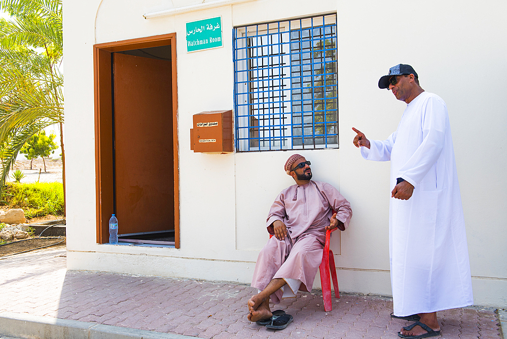 Watch man and ticket office at Bimmah Sinkhole (doline), near Tiwi, Sultanate of Oman, Arabian Peninsula, Middle East