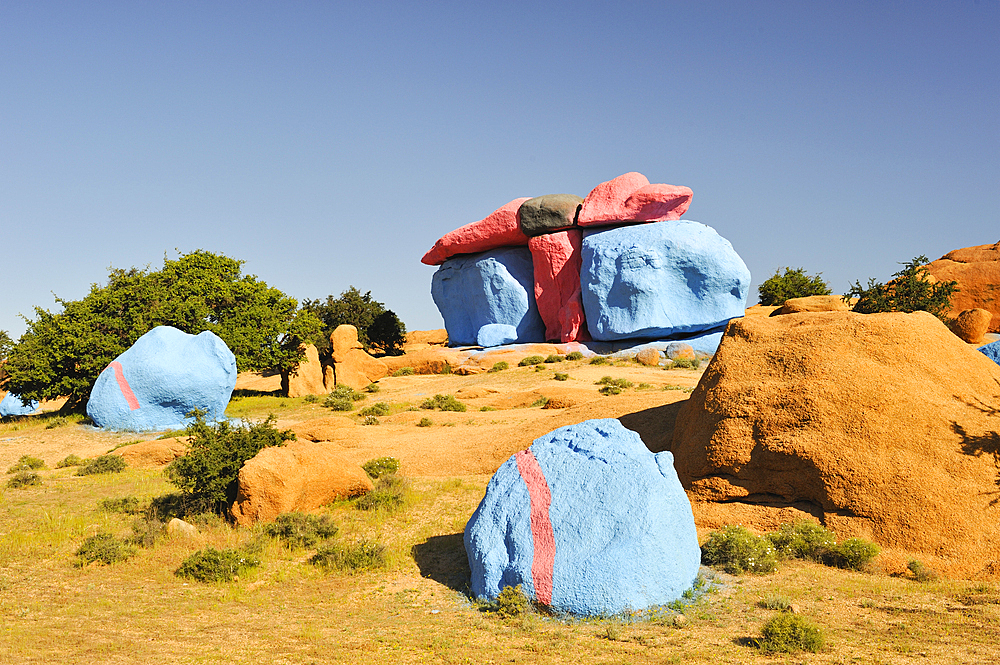 Painting Rocks site, work of the Belgian artist Jean Verame. around Tafraout,Anti-Atlas,Morocco,North Africa