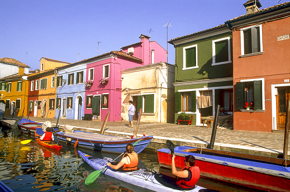 Kayak trip on a canal of Burano island, Venice, UNESCO World Heritage Site, Veneto region, Italy, Europe