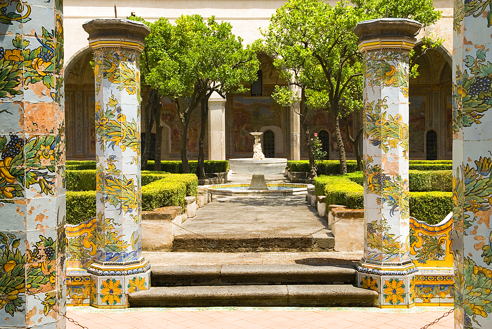 Cloister of the Clarisses, with the unique addition of majolica tiles in Rococo style, Santa Chiara complex, Naples, Campania region, Italy, Europe