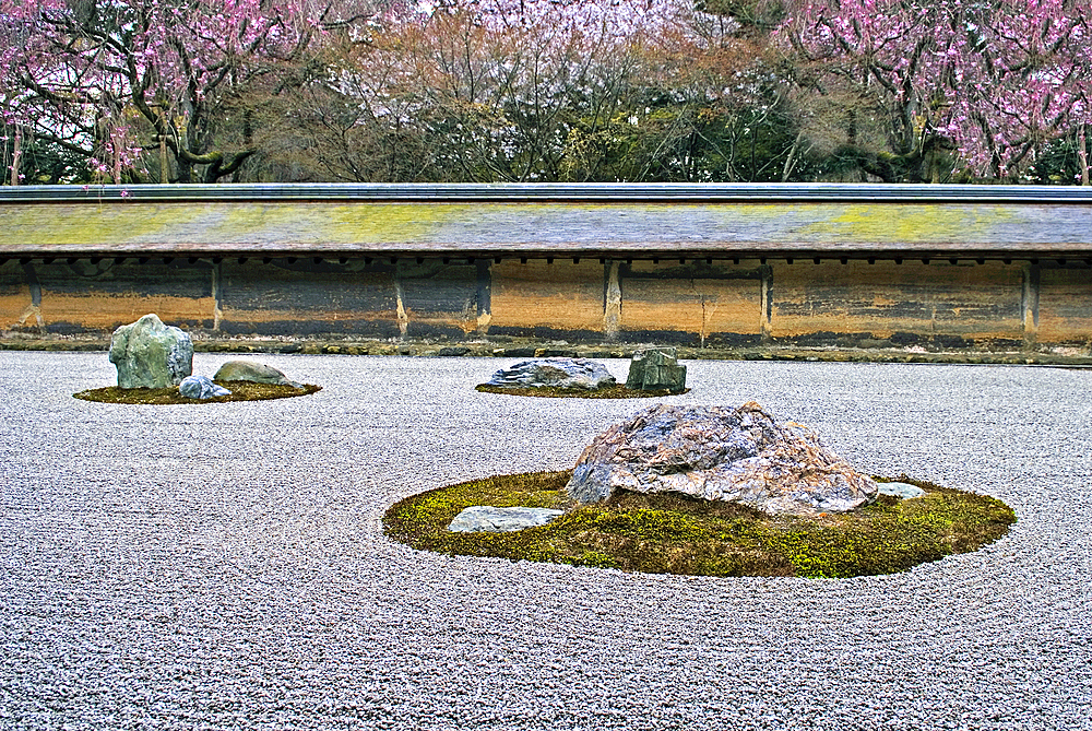 The kare-sansui (dry landscape) zen garden at Ryōan-ji (The Temple of the Dragon at Peace) one of the Historic Monuments of Ancient Kyoto, a UNESCO World Heritage Site. , Kyoto, Japan