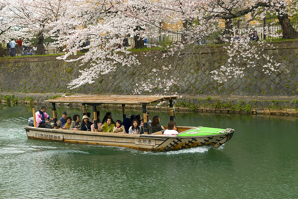 Pleasure cruise boat on the Kamo river, Kyoto, Japan