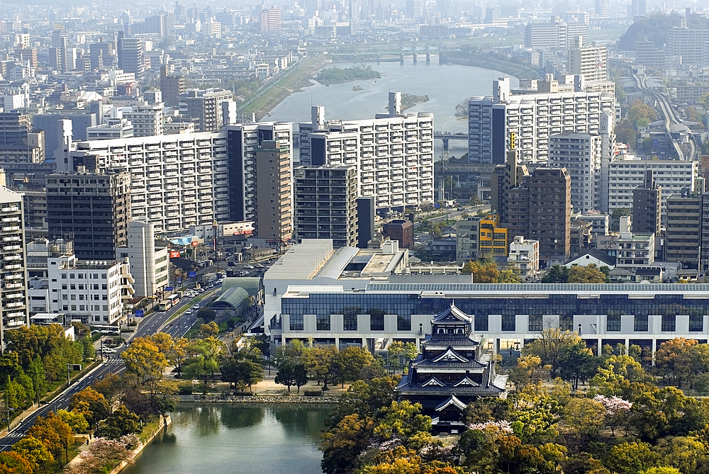 Hiroshima Castle called Carp Castle in the foreground was destroyed in the atomic bomb blast of August 6, 1945 and rebuilt in 1958, Hiroshima, Japan