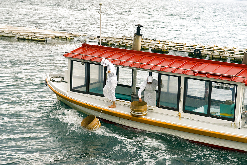 On the island of pearls of Mikimoto (named after the inventor and developer of the pearl culture: Kokichi Mikimoto 1858-1954), women divers in traditional clothing. Toba, Ise-Shima National Park, Japan