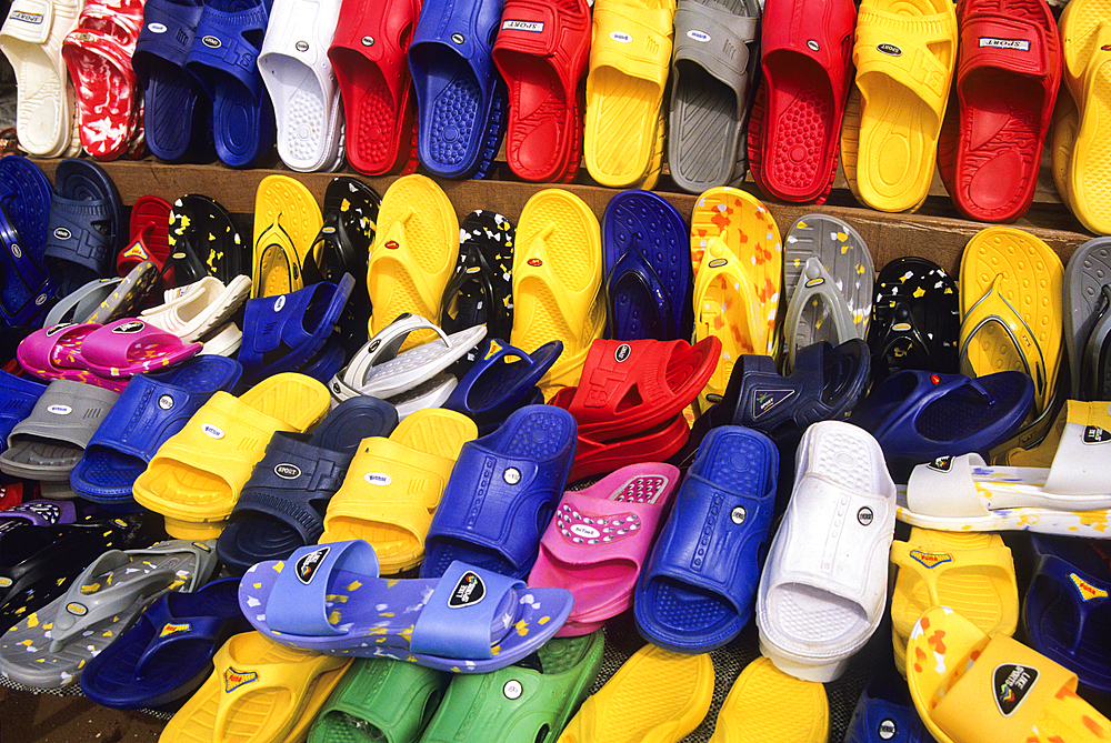 Plastic sandals display at the market of Natitingu, Atakora department, northwestern Benin, Africa