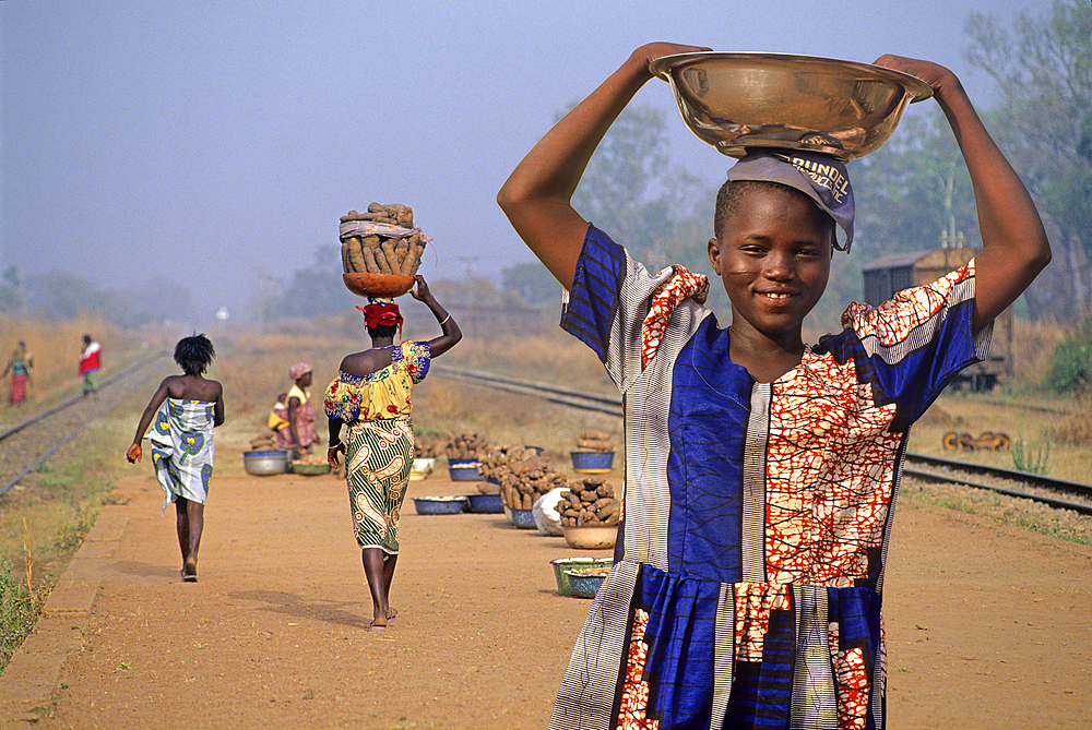 Street hawkers in railway station at Save, Collines department, Benin, Africa