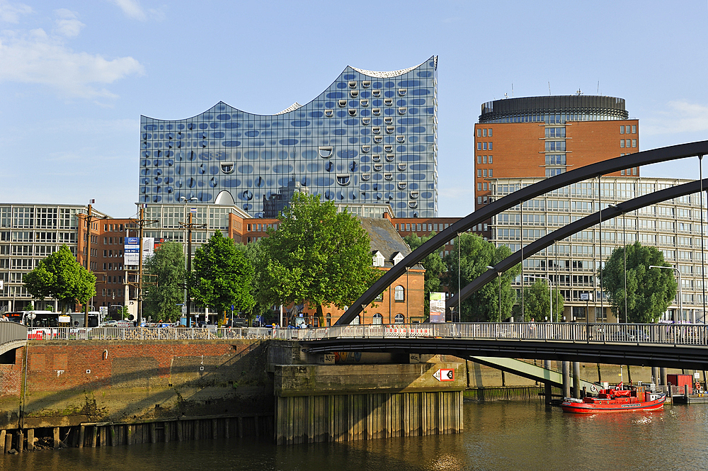 Elbphilharmonie, a concert hall built on top of an old warehouse building, by Swiss architecture firm Herzog and de Meuron, viewed from the Niederbaumbrucke bridge, HafenCity district, Hamburg, Germany, Europe