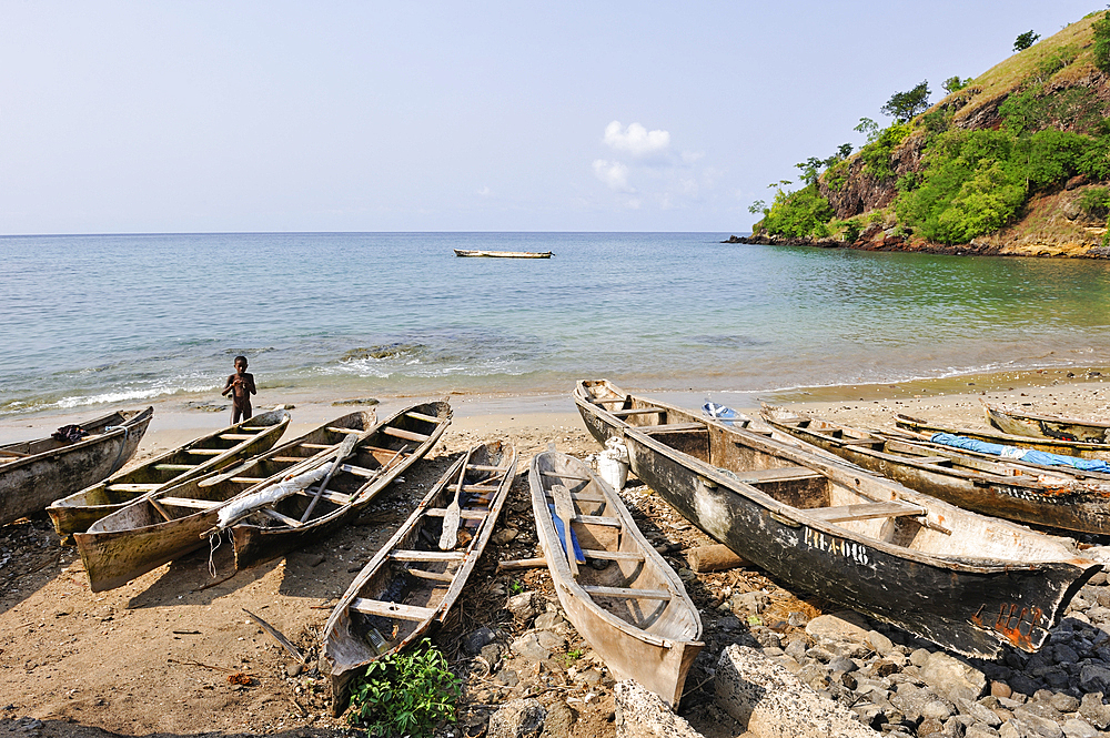Pirogues on the beach of Morro Peixe, fishermen village on the north coast of Sao Tome Island, Republic of Sao Tome and Principe,Africa