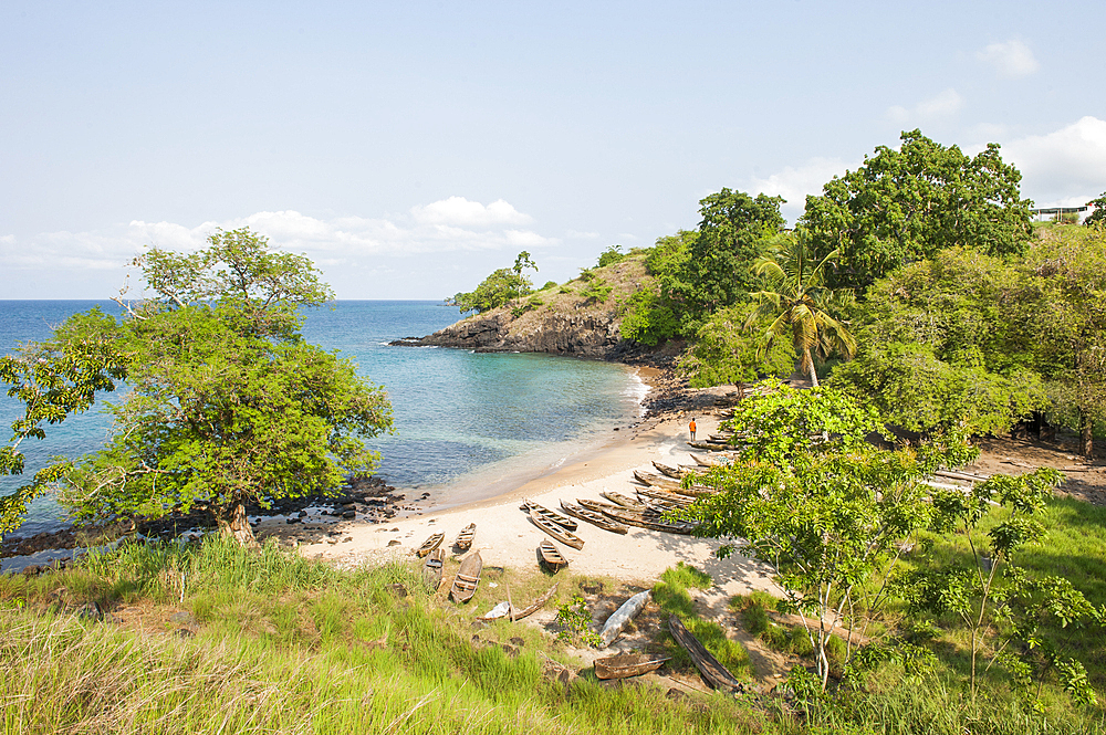 Fisherman's pirogues on a beach of the north coast of Sao Tome Island, Republic of Sao Tome and Principe,Africa