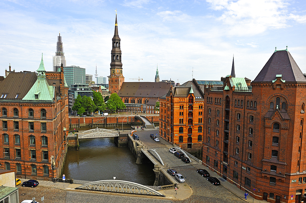 Aerial view of the Kleines Fleet canal in the Speicherstadt (City of Warehouses) with St. Catherine's Church in the background, HafenCity district, Hamburg, Germany, Europe