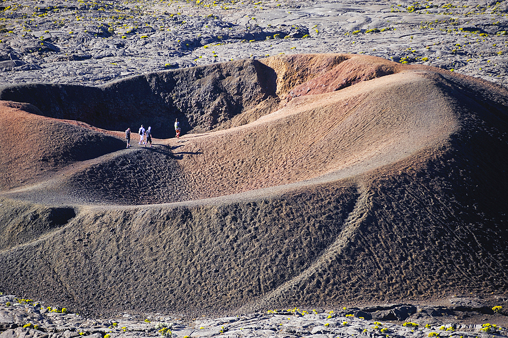 Small crater of Formica Leo volcano in caldera Enclos Fouque near Piton de la Fournaise volcano, viewed from Pas de Bellecombe.Reunion island,overseas departement of France,Indian Ocean