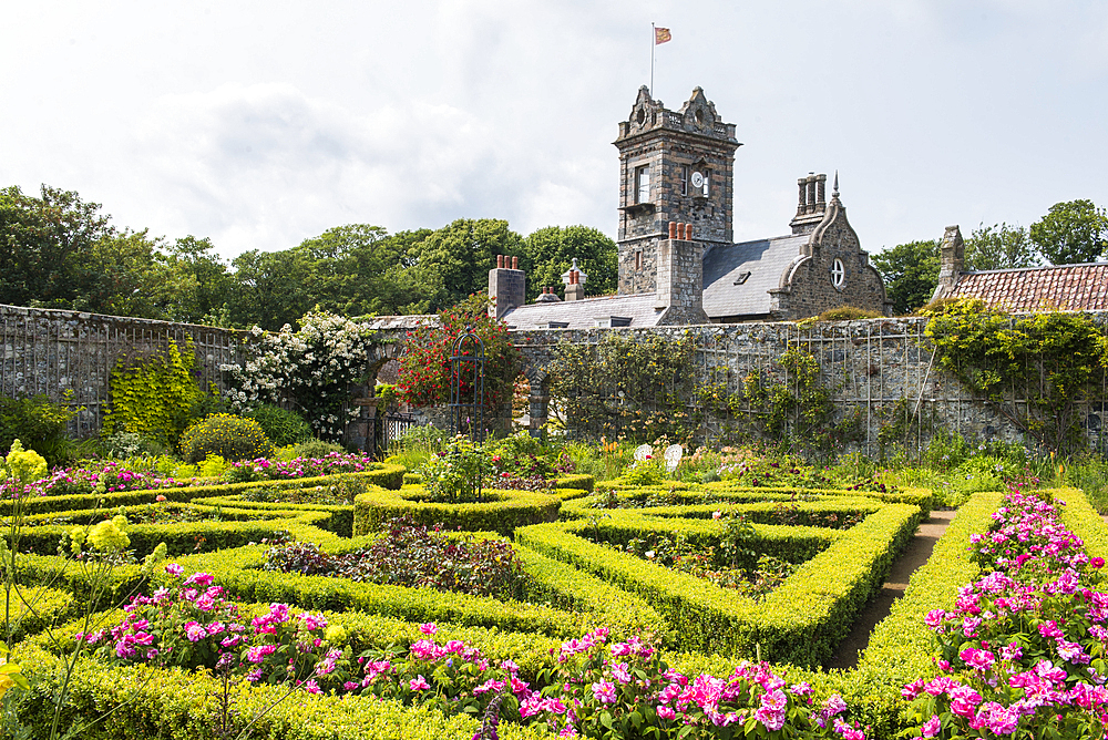 The walled garden with the house in the background, La Seignerie (17th Century), traditional residence of the Seigneur of Sark, Open to the public for the visit of the gardens, Sark island, Channel Islands, Bailiwick of Guernsey, United Kingdom