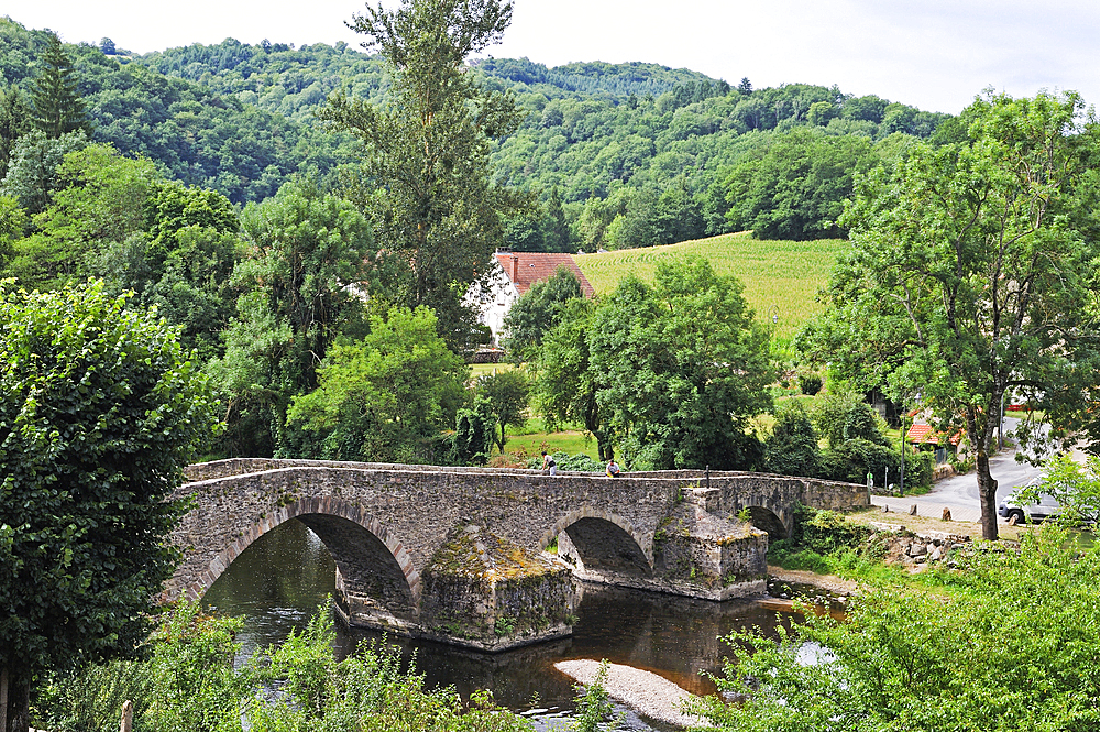 Medieval bridge of Menat across the River Sioule, Puy-de-Dome department, Auvergne-Rhone-Alpes region, France, Europe