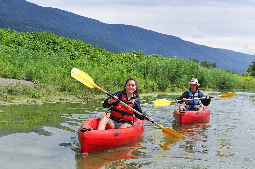 Canoeing on a section of Vieux Rhone River near Motz in Chautagne region,Savoie, Rhone-Alpes region, France, Europe