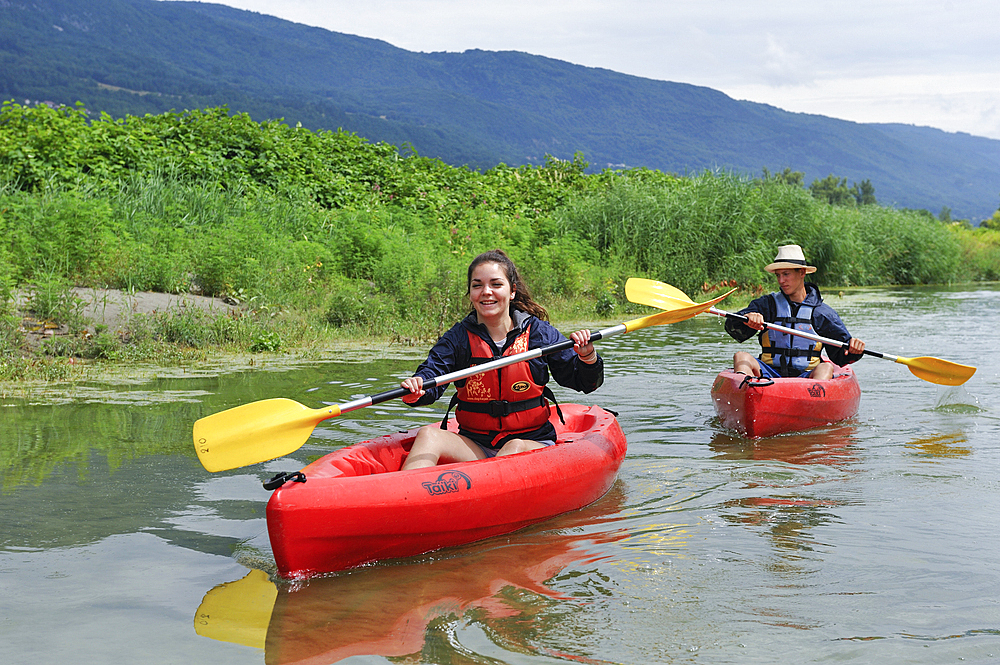 Canoeing on a section of Vieux Rhone River near Motz in Chautagne region,Savoie, Rhone-Alpes region, France, Europe