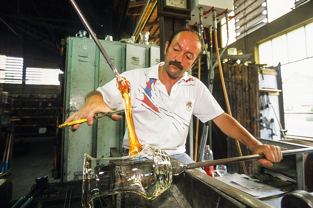Crystal carafe manufacturing,adding handle,Hartzviller Crystalworks,Moselle department,Lorraine region,France,Europe