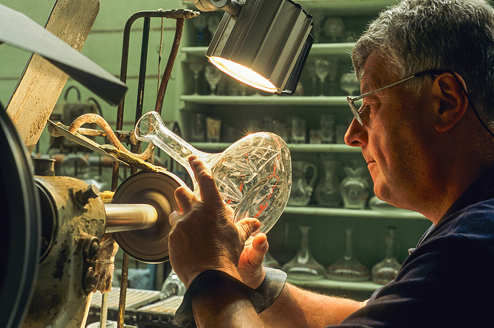 Cutting crystal carafes,Hartzviller Crystalworks,Moselle department,Lorraine region,France,Europe