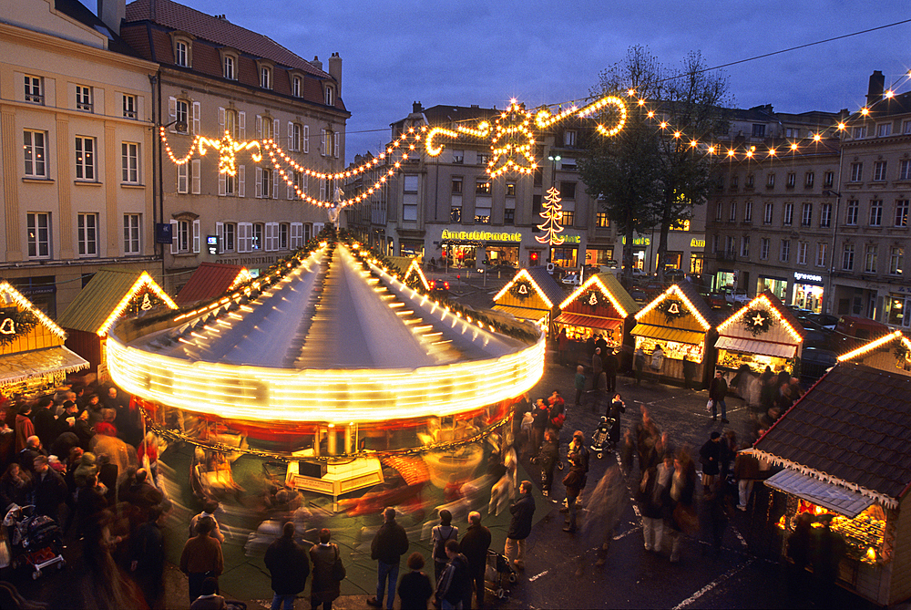 Merry-go-round and Christmas market on Saint-Louis square,Saint Nicholas Day,Metz,Moselle department,Lorraine region,France,Europe