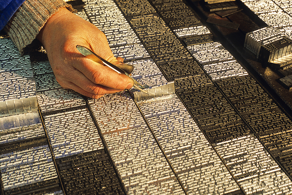 Manual composition of type letters, letterpress printing,'Le Democrate de L' Aisne', In an atmosphere and a setting of the end the XIXth, beginning of the XXth century, the production method of the paper has not changed, what used to be a daily is now a w