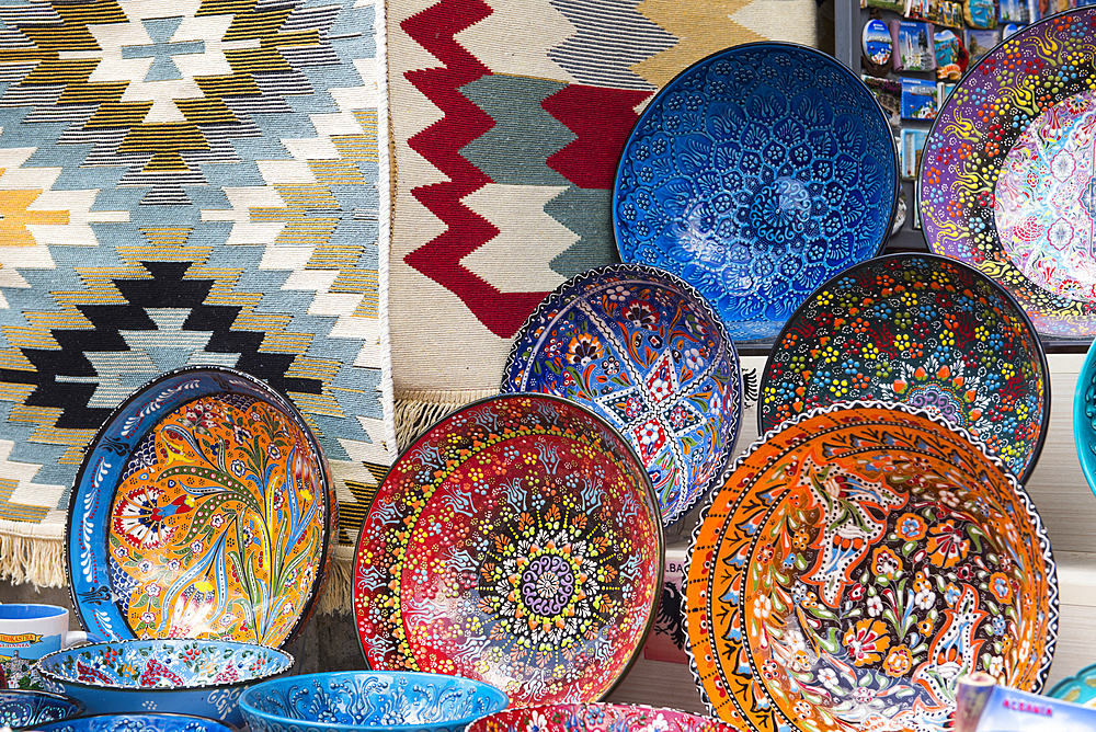 Carpets and ceramics in a showcase, Gjirokaster (Gjirokastra), Municipality of Southern Albania, UNESCO World Heritage Site, Albania, Europe