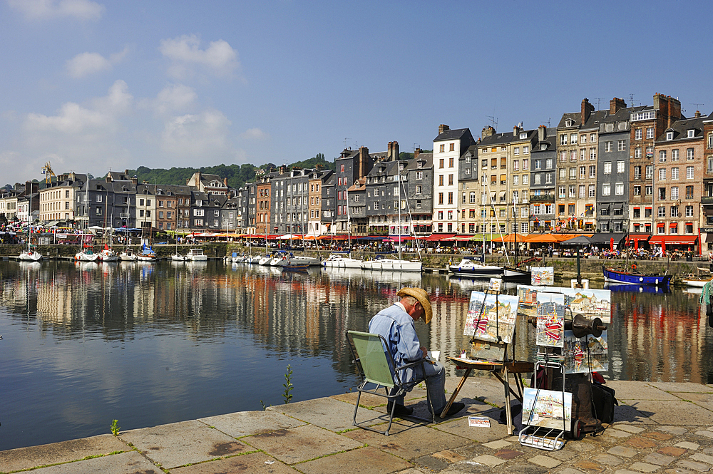 Painter at Honfleur harbour,Calvados department,Lower Normandy region,Northwestern France,Western Europe