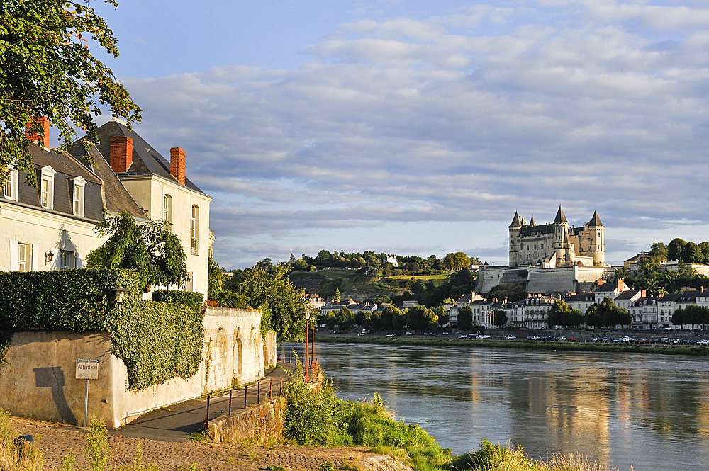 Loire River bank with the Chateau de Saumur in the background, Maine-et-Loire department, Pays de la Loire region, France, Europe