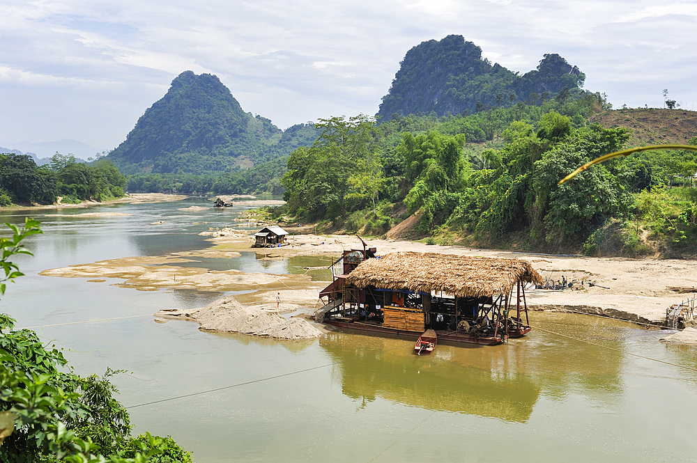 Gold digger's barge on Lo river, Ha Giang province, Northern Vietnam, Southeast Asia